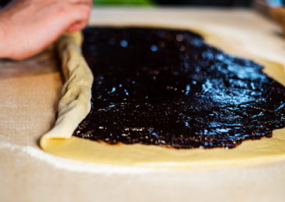 Chocolate Babka Rolling Dough Into Cigar 1