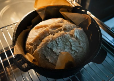 Sourdough Bread Baked In A Dutch Oven After Taking The Lid Off