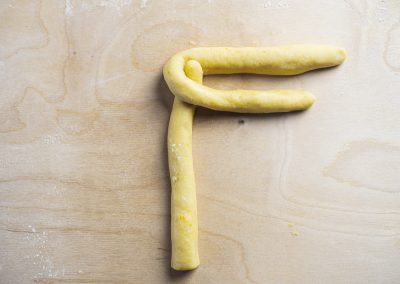 Koulourakia Traditional Greek Easter Cookies Shaping Into Braid 2