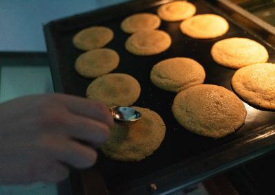 Chewy Brown Sugar Cookies With Cinnamon Pressing Dough Down While Baking