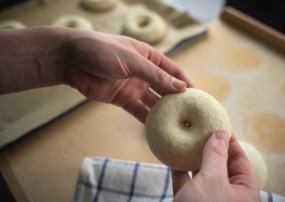 Huge Bread Rolls With Sesame And Poppy Seeds Widening Hole In Dough 1