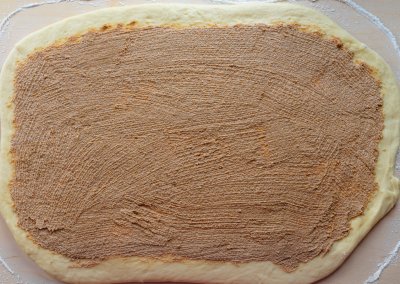 Homemade Cinnamon Rolls Spread Cinnamon Filling On Dough