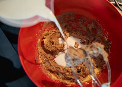 Bat Spider Halloween Cupcakes Adding Milk To Mixture