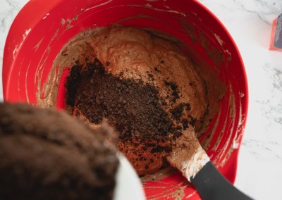 Bat Spider Halloween Cupcakes Folding In Oreo Crumbles And Chocolate