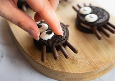Bat Spider Halloween Cupcakes Securing Googly Candy Eyes